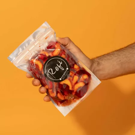 Bag of Peach rings coated with RefiSnacks chamoy paste