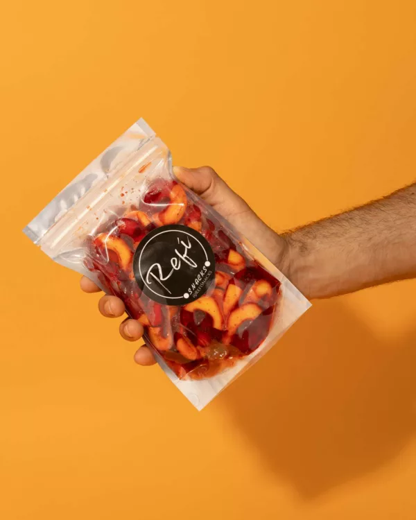 Bag of Peach rings coated with RefiSnacks chamoy paste