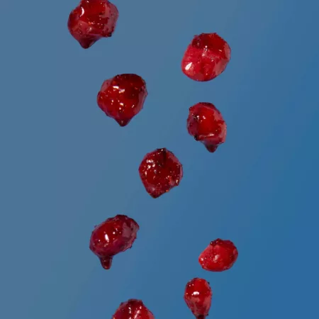 Gushers snacks covered in RefiSnacks chamoy paste falling from the top of the screen