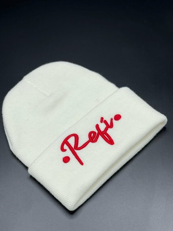 A white RefiSnacks beanie with Refi written in Red