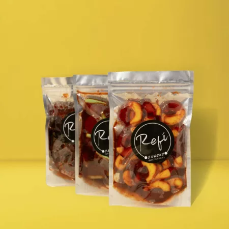 Three packs of candy covered RefiSnacks chamoy paste